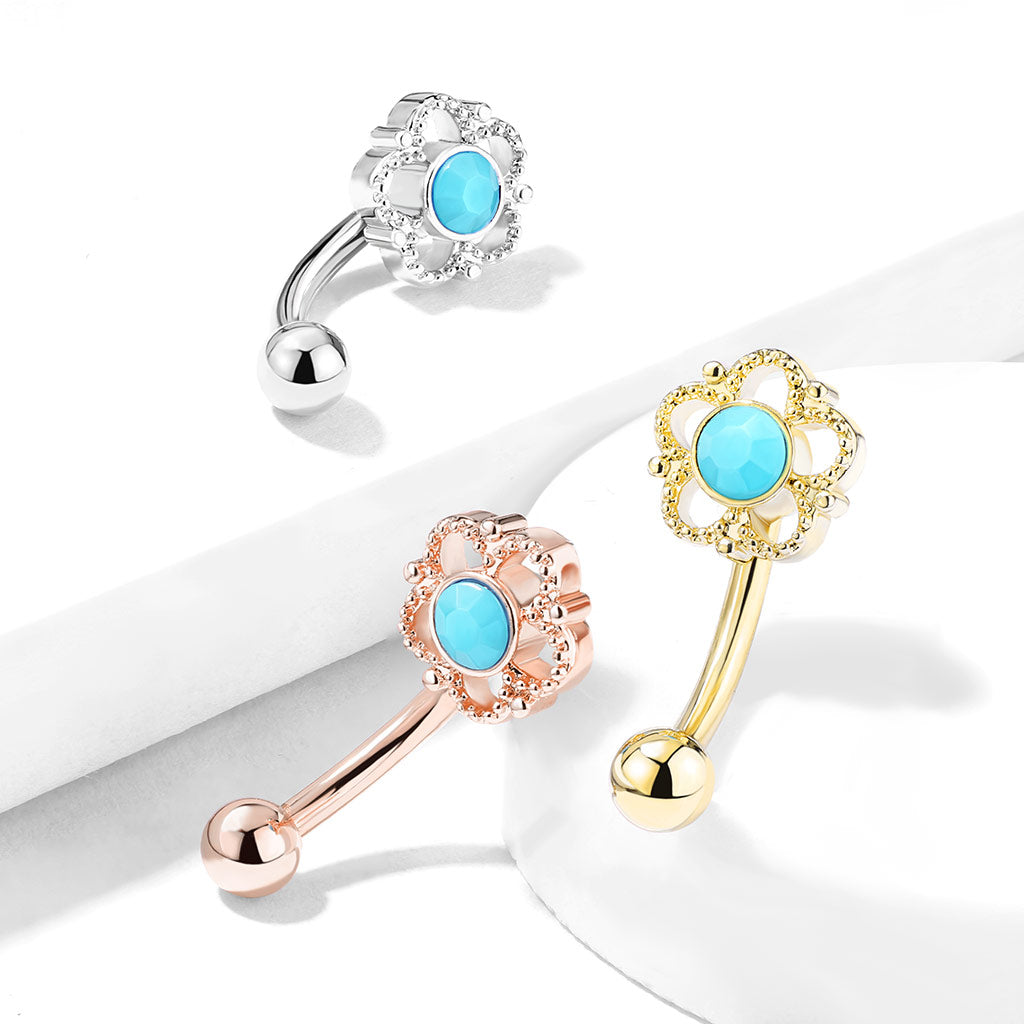 PRETTY FLOWER CURVED BARBELL WITH TURQUOISE STONE CENTRE - 8MM - 16 GAUGE